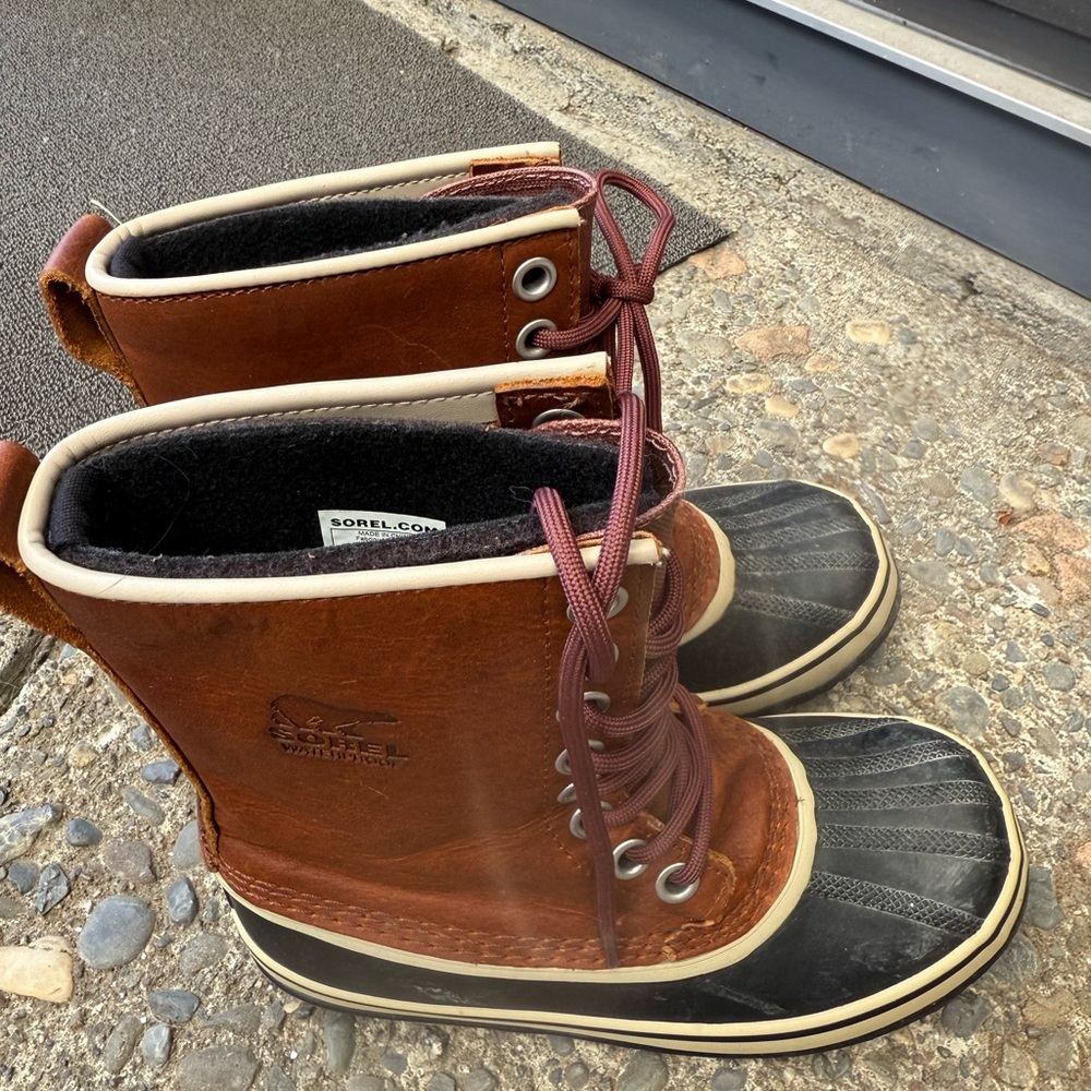 Sorel Tan and Black Lace-Up Boots